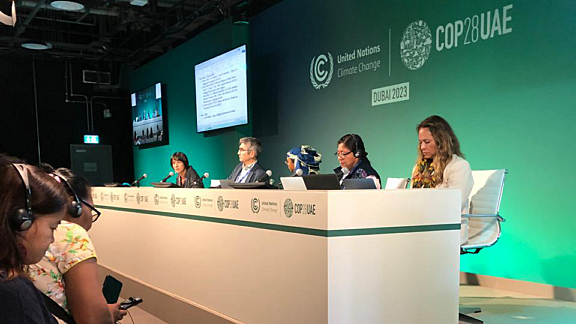 Indigenous Peoples participate in a caucus session at COP28 in Dubai with the environmental minister of Colombia.